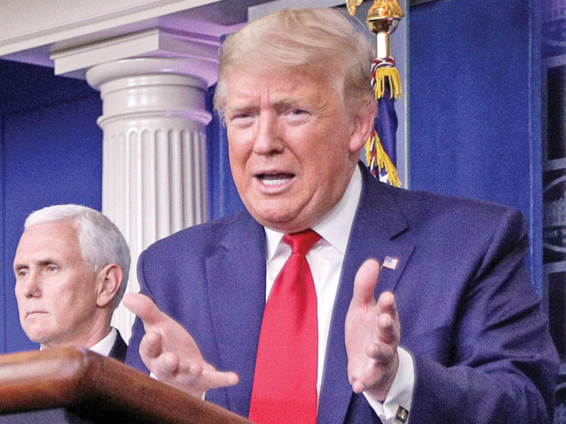ترامب خلال مؤتمر صحافي في واشنطن أمس الأول t (رويترز)