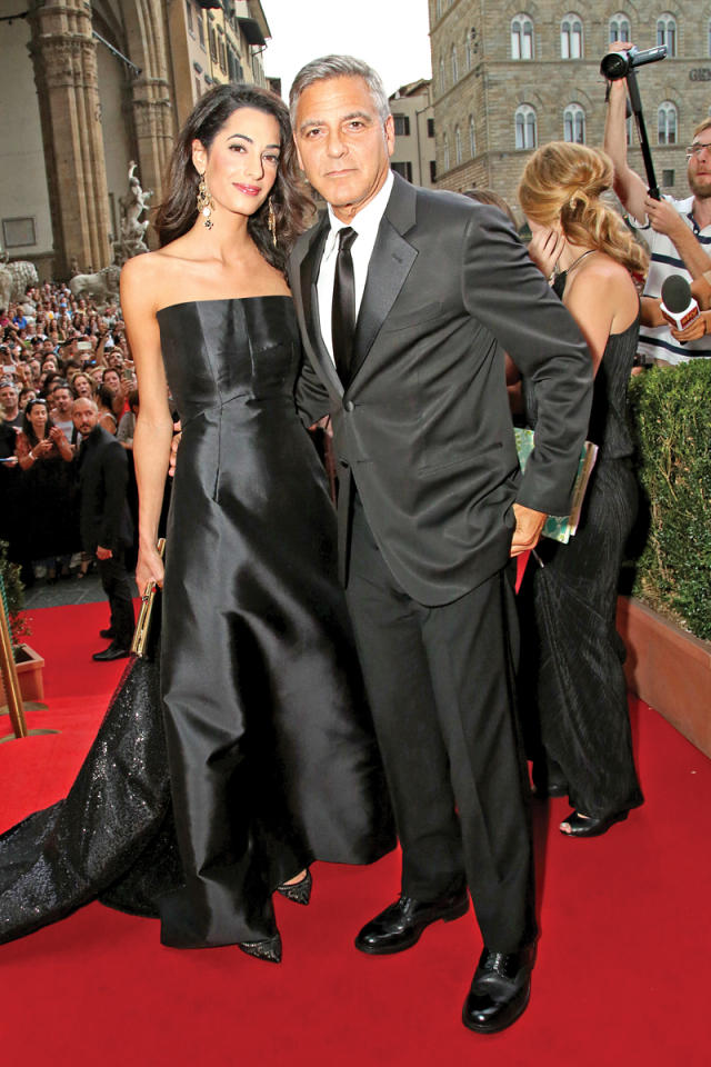 الممثل الأميركي جورج كلوني وزوجته أمل علم الدين