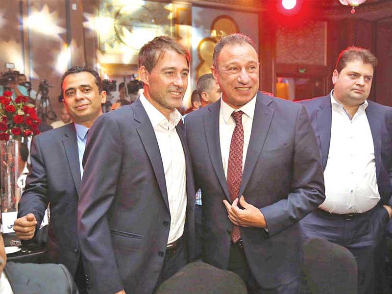 رئيس النادي الأهلي محمود الخطيب و مدرب فريق الكرة الأول بالنادي الاهلي رينيه فايلر 