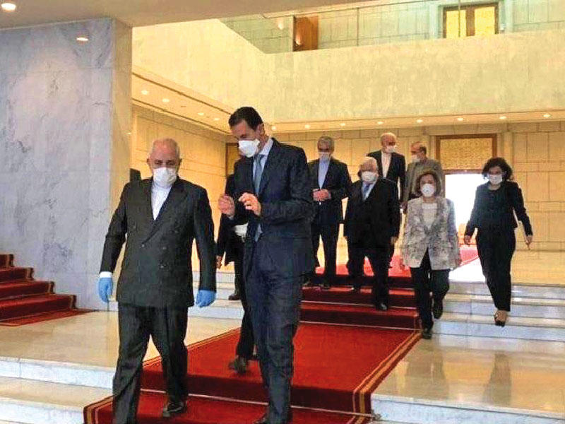 الأسد خلال استقباله ظريف في دمشق الاثنين الماضي