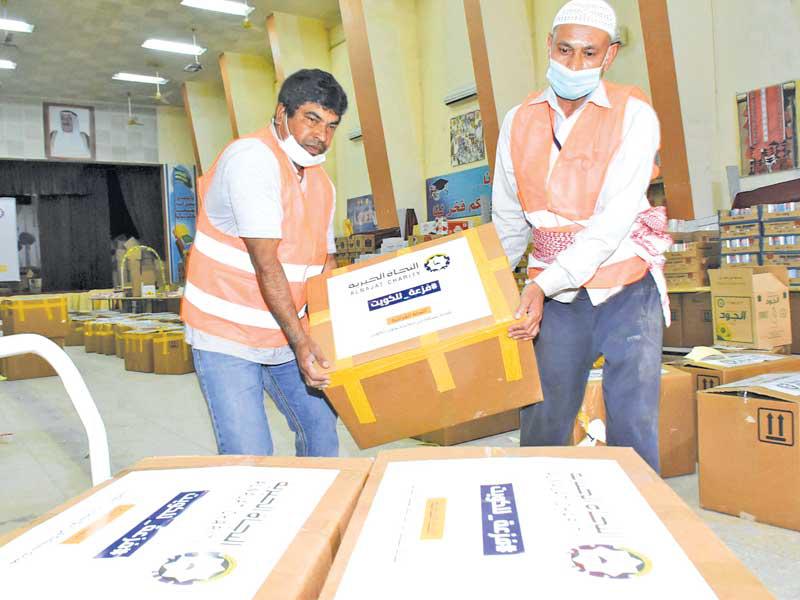 النجاة الخيرية توزع 23 ألف سلة غذائية 