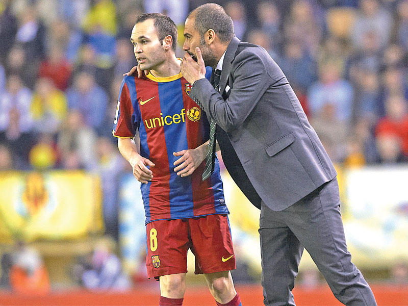 أندريس إنييستا مع جوسيب غوارديولا