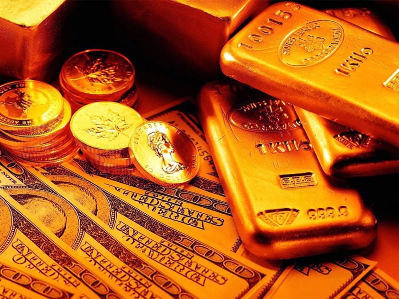 الذهب يهبط مع صعود الدولار وفتح الاقتصادات تدريجياً 