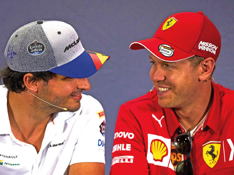  كارلوس ساينز وسيباستيان فيتل في مؤتمر صحافي سابق