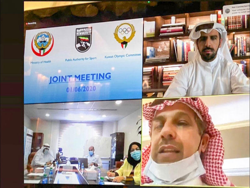 جانب من اجتماع اللجنة الثلاثية عن طريق الاتصال المرئي