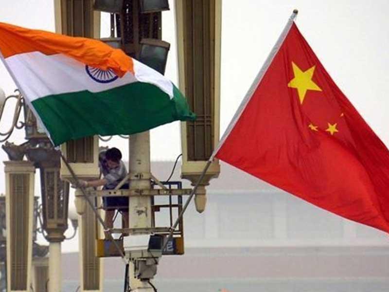 الهند والصين تلتزمان بحل خلافات الحدود سلمياً