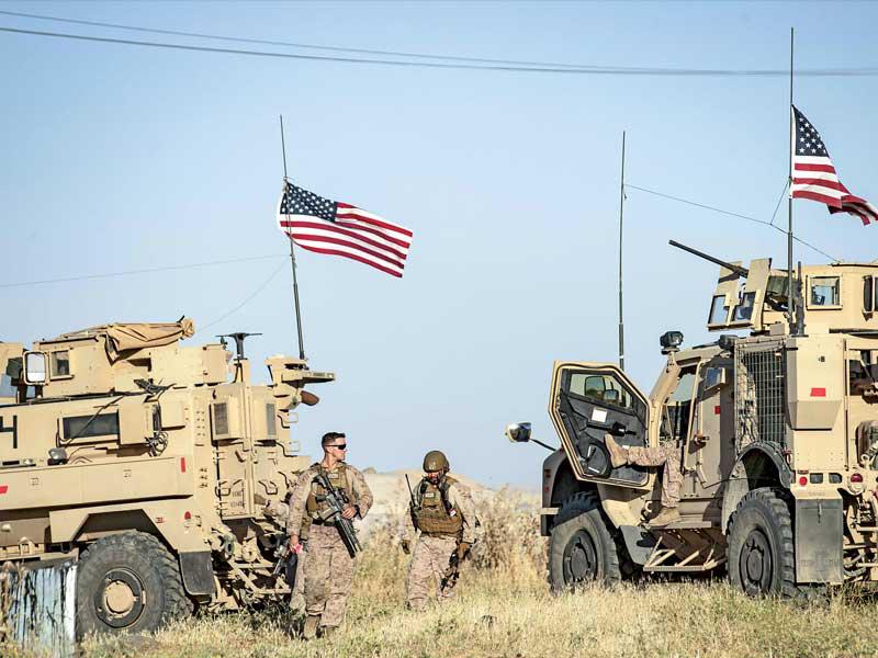 قوة أميركية في قرية المالكية على الحدود الشمالية الشرقية لسورية مع تركيا أمس الأول (ا ف ب)