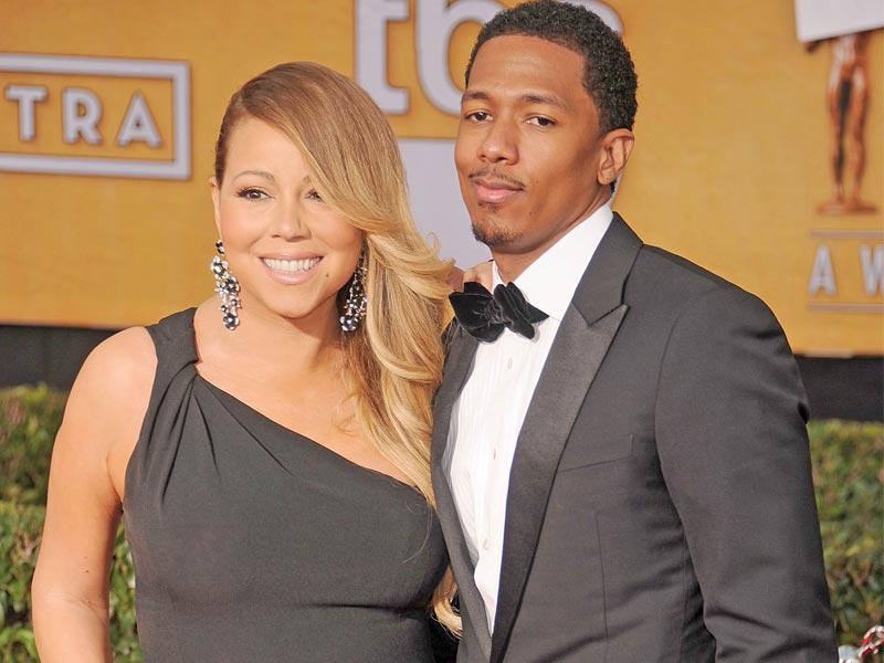 النجم العالمي ​نيك كانون مع زوجته السابقة المغنية ​ماريا كاري