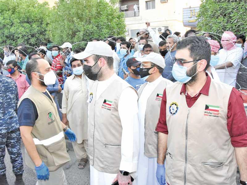 جانب من توزيع جمعية النجاة الخيرية  4800 سلة غذائية و9 آلاف كيس خبز بمنطقة الجليب والمهبولة 