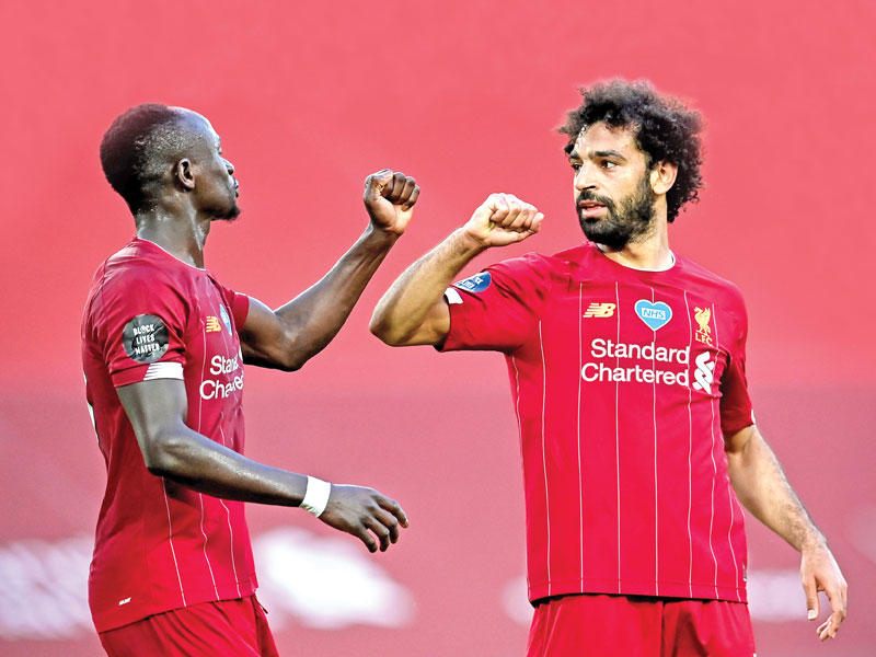نجمي ليفربول الإنكليزي  المصري محمد صلاح والسنغالي ساديو ماني