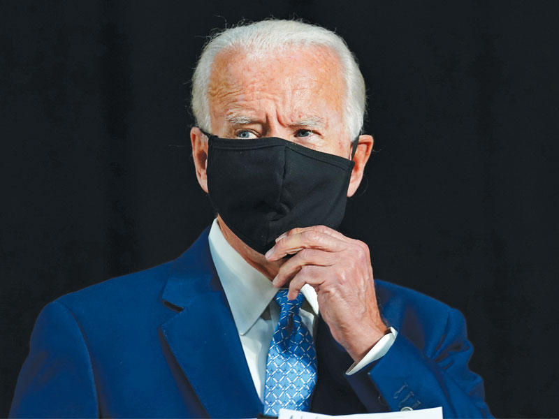 بايدن خلال كلمة مصورة في ديلاوير أمس الأول (رويترز)