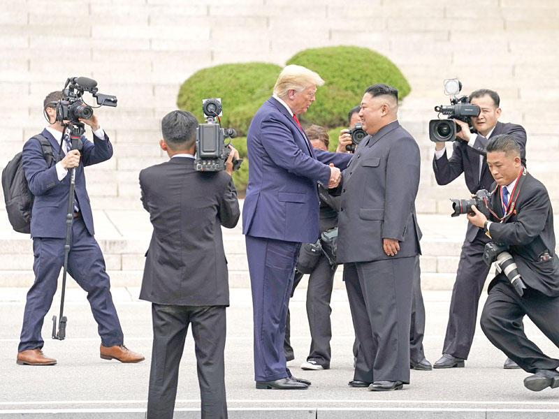 الرئيس الأميركي دونالد ترامب والزعيم الكوري الشمالي كيم جونغ 