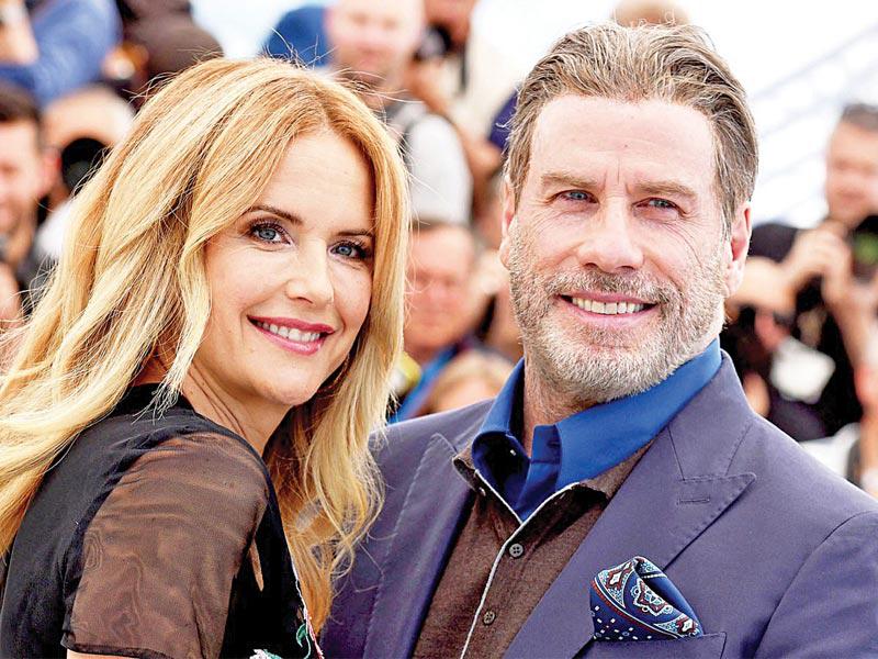 الممثل الأميركي الشهير جون ترافولتا وزوجته الممثلة كيلي بريستون 