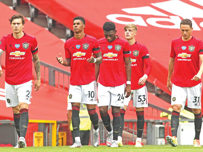 لاعبو مانشستر يونايتد خلال مباراة سابقة