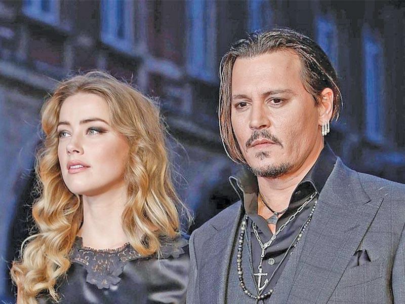 الممثل جوني ديب وزوجته الممثلة آمبر هيرد