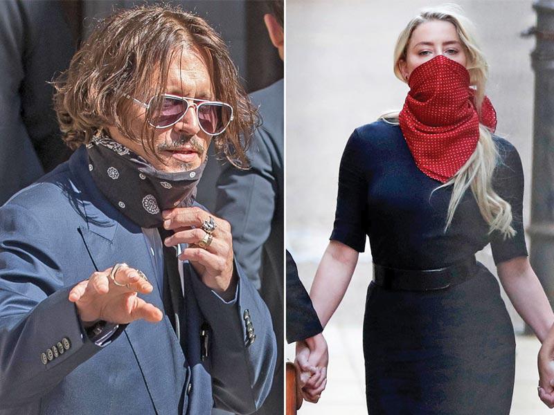 النجم جوني ديب ووزجته الفنانة آمبر هيرد قبل دخولهما المحكمة