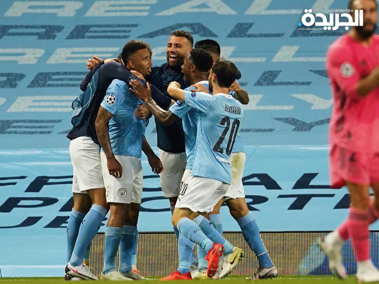 لاعبو السيتي يتحتفلون بفوزهمn