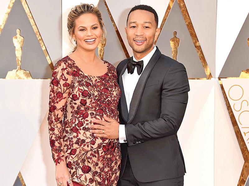 النجم العالمي ​جون لجند،​ وزوجته النجمة العالمية ​كريسي تايغن