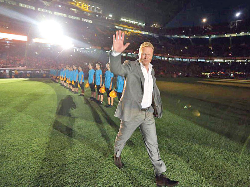 كومان مدرب برشلونة