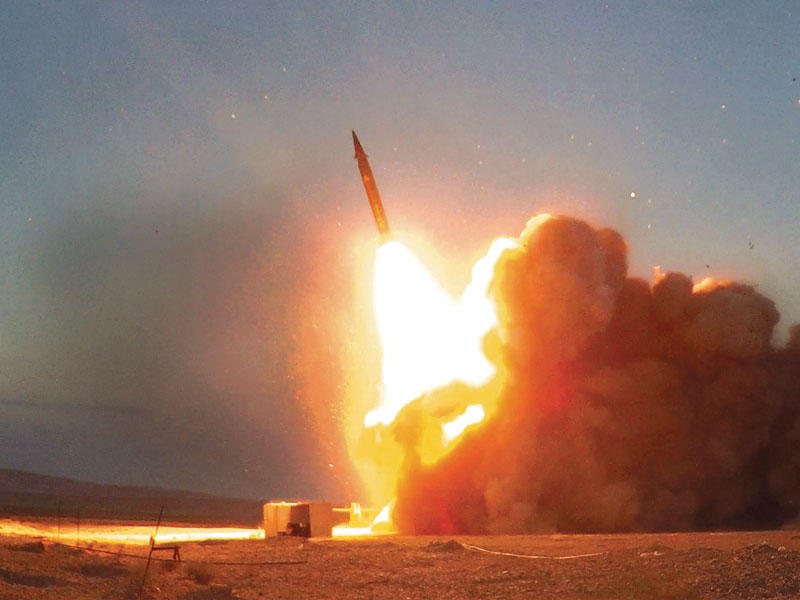 إيران تختبر أحد الصاروخين أمس (رويترز)
