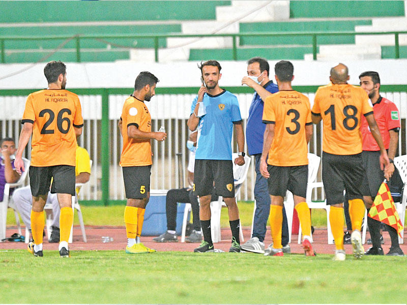 لاعبو القادسية في لقاء سابق