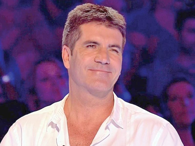 النجم العالمي ​سايمون كاول