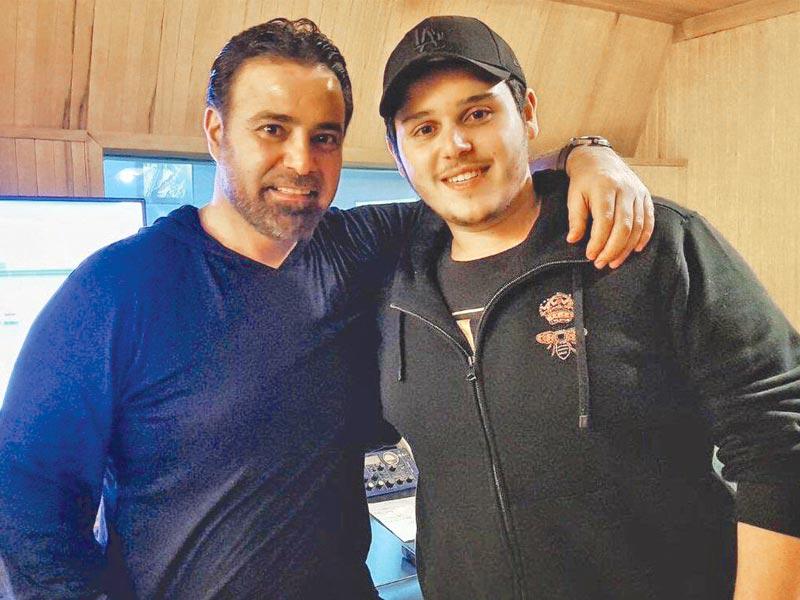 المطرب اللبناني عاصي الحلاني وابنه