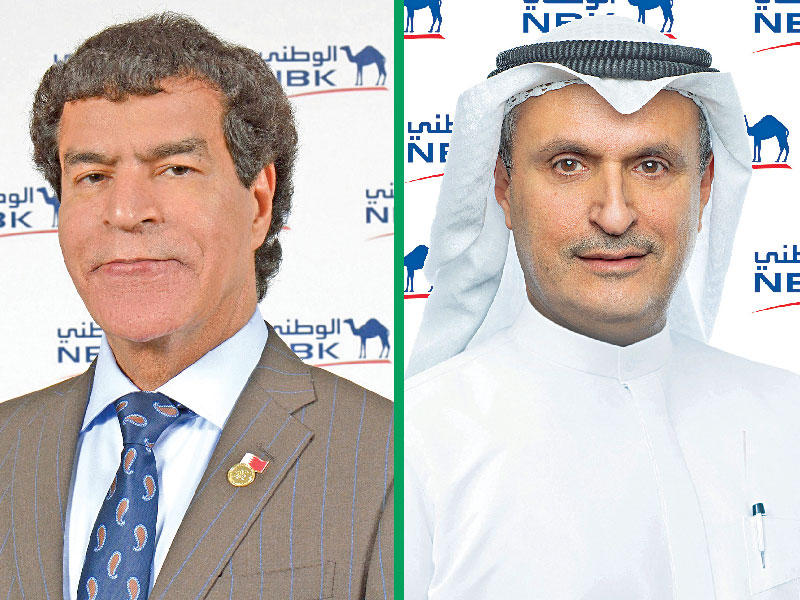 الرئيس التنفيذي لمجموعة بنك الكويت الوطني عصام جاسم الصقر - المدير العام لبنك الكويت الوطني- البحرين علي فردان