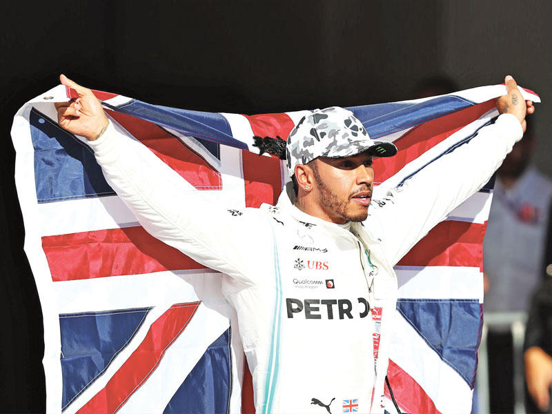 سائق مرسيدس البريطاني لويس هاميلتون 