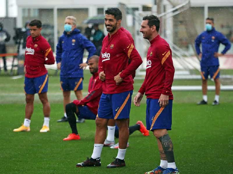ميسي وسواريز خلال تدريبات برشلونة