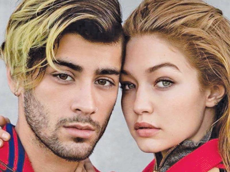 عارضة الأزياء الشهيرة جيجي حديد وصديقها المغني زين مالك