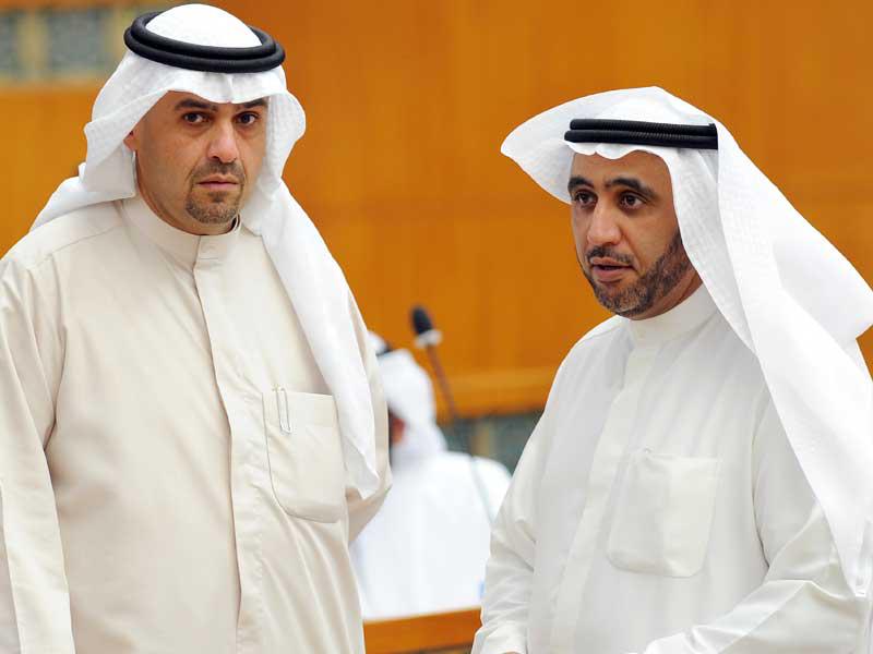 نائب رئيس مجلس الوزراء وزير الداخلية وزير الدولة لشؤون مجلس الوزراء أنس الصالح والنائب محمد الدلال