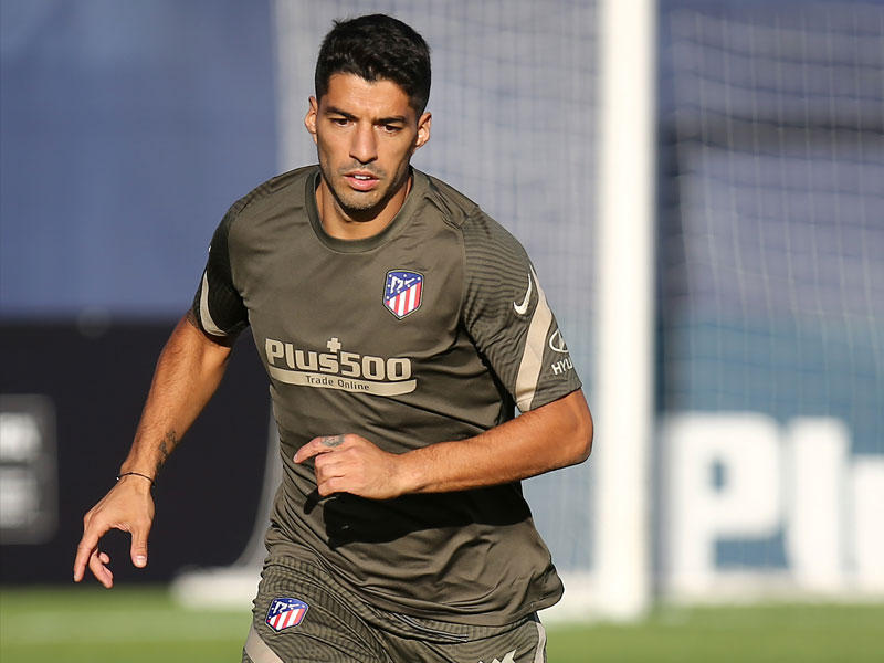 سواريز خلال تدريبات أتلتيكو مدريد