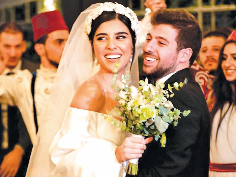 الفنانة اللبنانية زينة مكي بزفافها على زوجها الملحن نبيل خوري