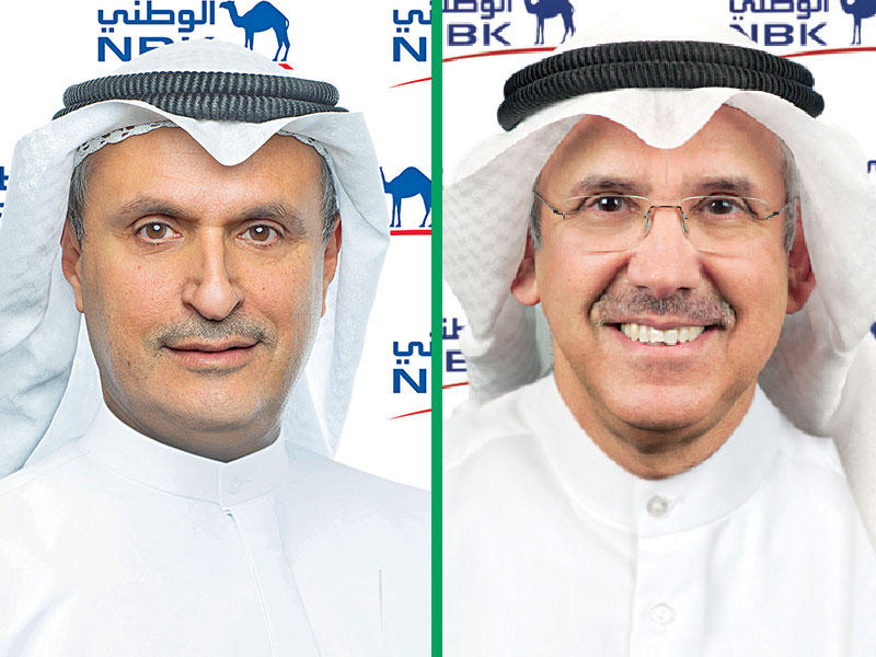 من يمين الصورة رئيس مجلس إدارة بنك الكويت الوطني ناصر الساير والرئيس التنفيذي لمجموعة بنك الكويت الوطني عصام الصقر