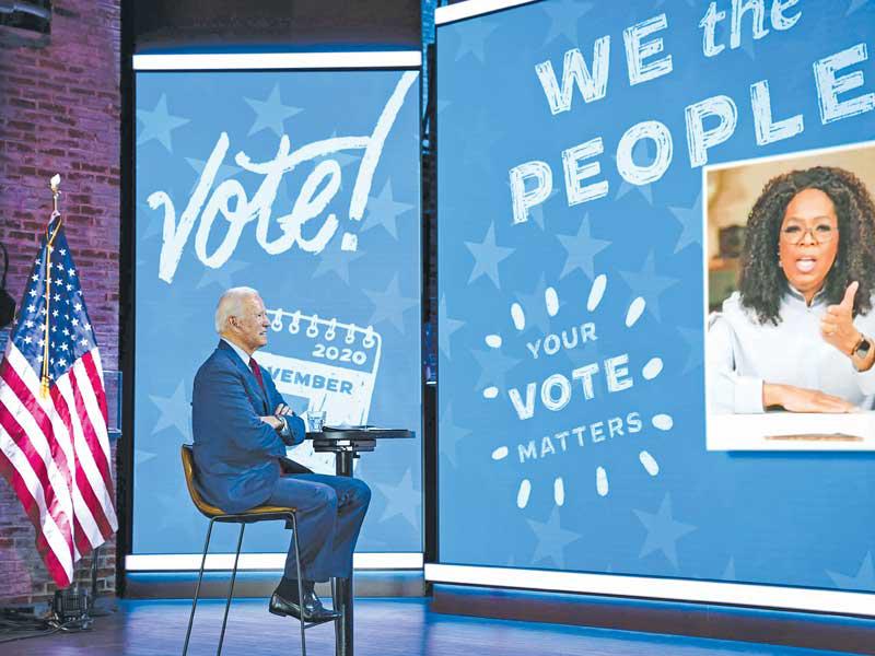 بايدن مع أوبرا وينفري في حدث افتراضي  في ديلاوير أمس الأول (أ ف ب)