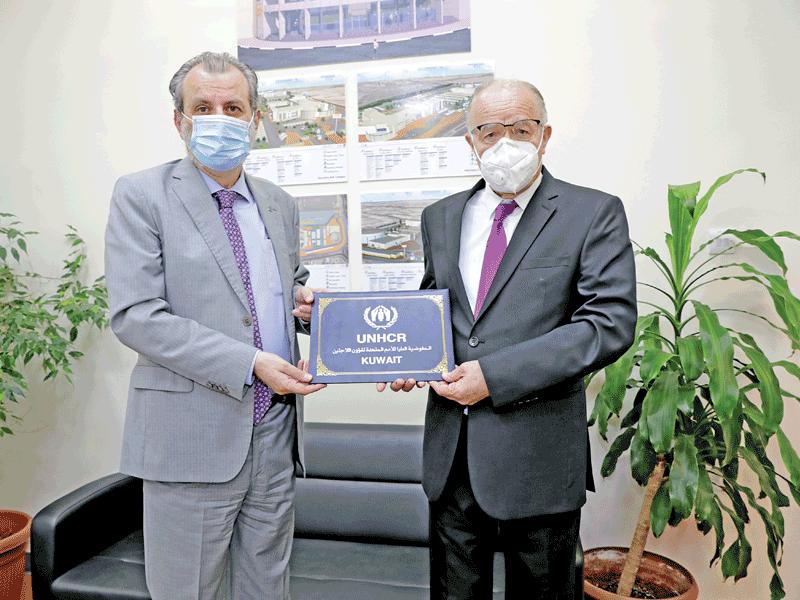 رئيس الكلية الأسترالية في الكويت د. عصام زعبلاوي ورئيس مكتب مفوضية الأمم المتحدة السامية لشؤون اللاجئين لدى الكويت د. سامر حدادين خلال اللقاء