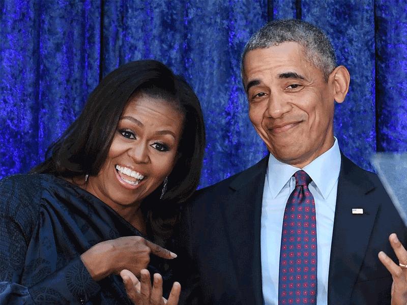 الرئيس السابق باراك أوباما وزوجته ميشيل 