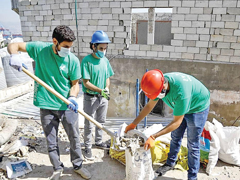 متطوعو لوياك جنباً إلى جنب