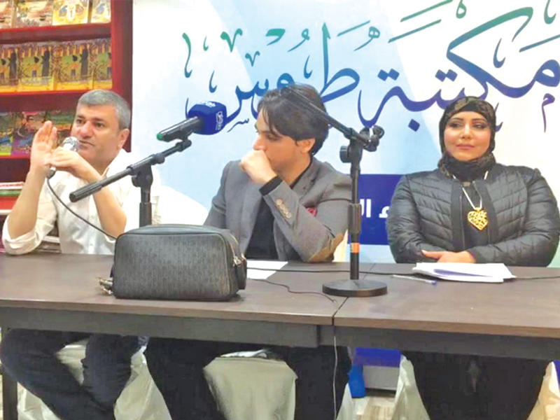 المليفي وأبو الملح والرفاعي أثناء الندوة