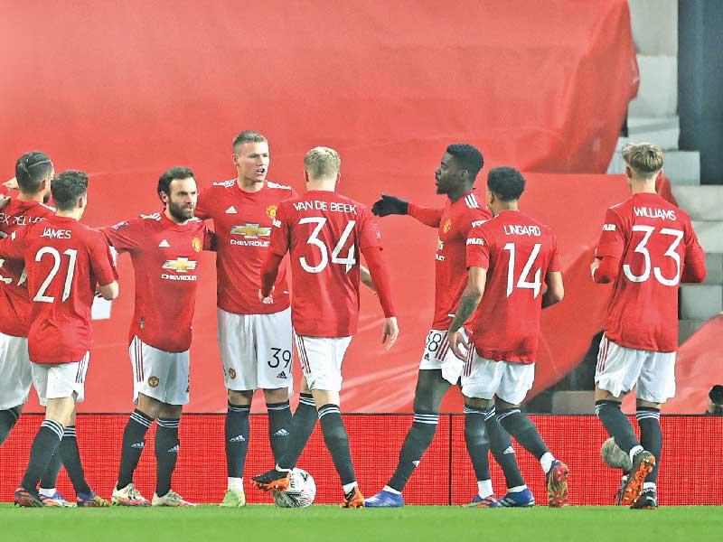 لاعبو مانشستر يونايتد خلال مباراة سابقة