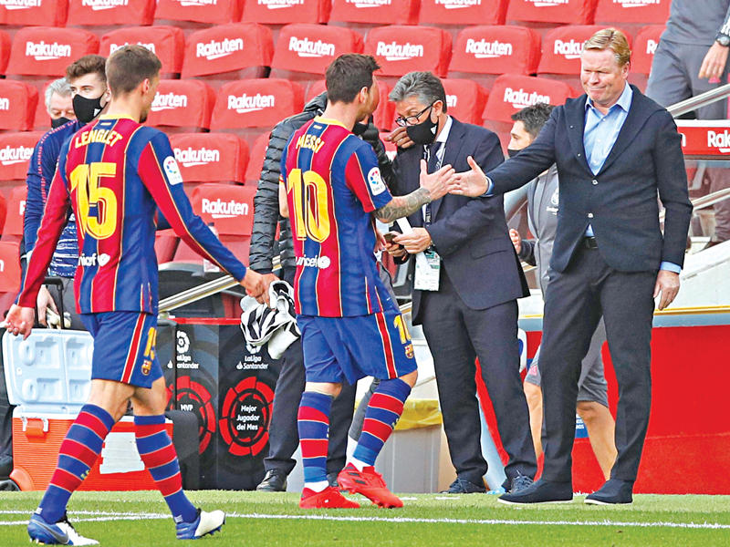 مدرب نادي برشلونة رونالد كومان وليونيل ميسي نجم الفريق