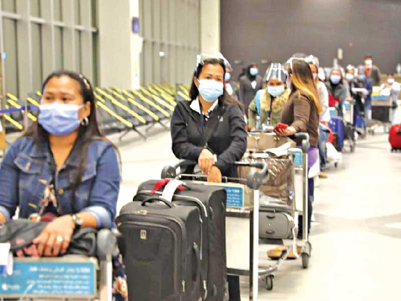 جانب من العمالة المنزلية العائدة 