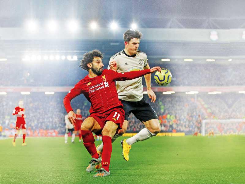 صلاح نجم ليفربول وماغواير نجم مان يونايتد خلال مباراة سابقة