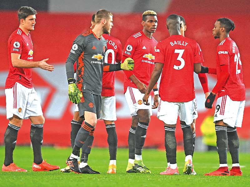 لاعبو مان يونايتد خلال مباراة سابقة