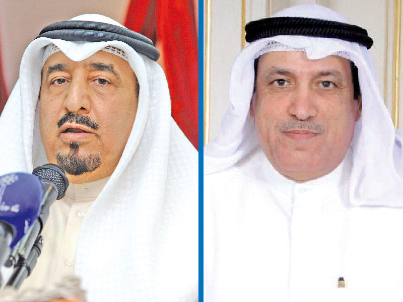 عميد كلية التربية الأساسية، د. فريح العنزي-رئيس لجنة الدراسات العليا بالكلية د. موسى غضبان