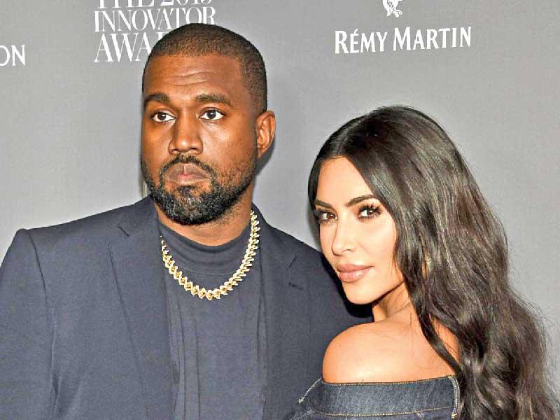 الفنانة كيم كارداشيان وزوجها مغني الراب كانييه ويست