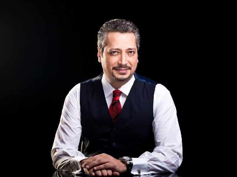 الاعلامي تامر أمين