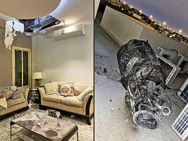 صورة مركبة لصاروخ الحوثي على سطح منزل وداخله في الرياض أمس (أ ف ب)n