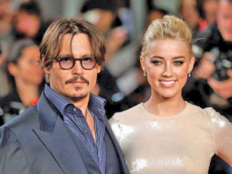 الممثل جوني ديب  وآمبر هيرد